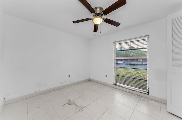 2700 Bayshore Blvd Unit 2110, Dunedin, FL 34698 - spare room featuring ceiling fan and baseboards