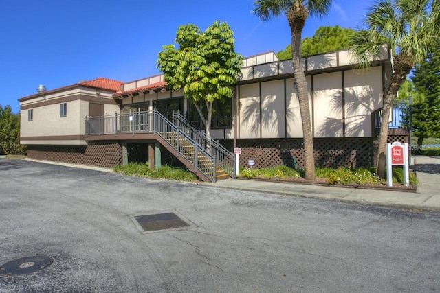 2700 Bayshore Blvd Unit 2110, Dunedin, FL 34698 - view of property featuring stairway