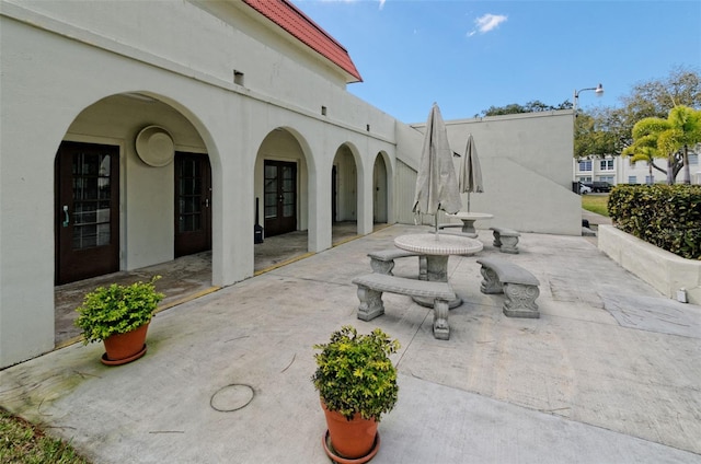 2700 Bayshore Blvd Unit 2110, Dunedin, FL 34698 - view of patio / terrace with french doors