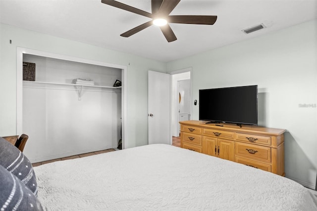 1045 28th Ave S, Saint Petersburg, FL 33705 - bedroom featuring a closet and a ceiling fan