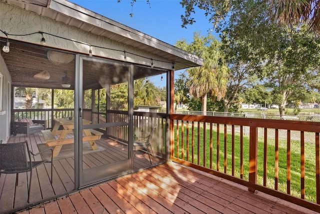 1045 28th Ave S, Saint Petersburg, FL 33705 - wooden terrace featuring a sunroom