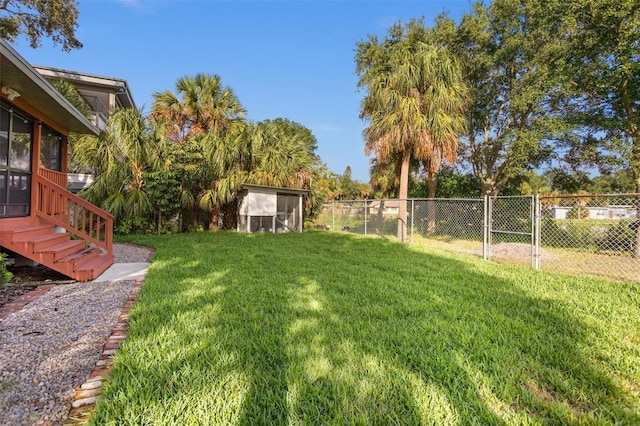 1045 28th Ave S, Saint Petersburg, FL 33705 - view of yard featuring a sunroom