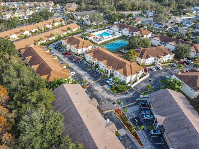 aerial perspective of suburban area with a pool