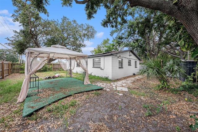 5801 92nd Ave N, Pinellas Park, FL 33782 - fenced backyard featuring a gazebo