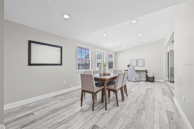 812 60th St S, Gulfport, FL 33707 - dining space with light wood-style floors, baseboards, and recessed lighting
