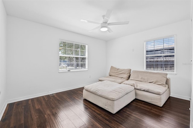 812 60th St S, Gulfport, FL 33707 - sitting room featuring wood finished floors, baseboards, and ceiling fan