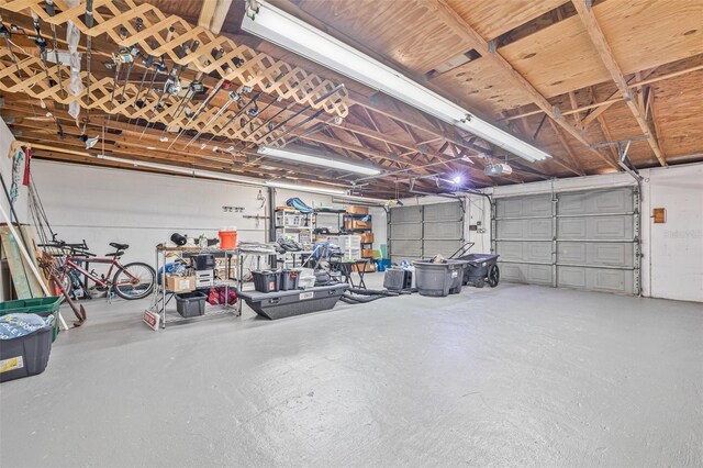 812 60th St S, Gulfport, FL 33707 - garage featuring a garage door opener