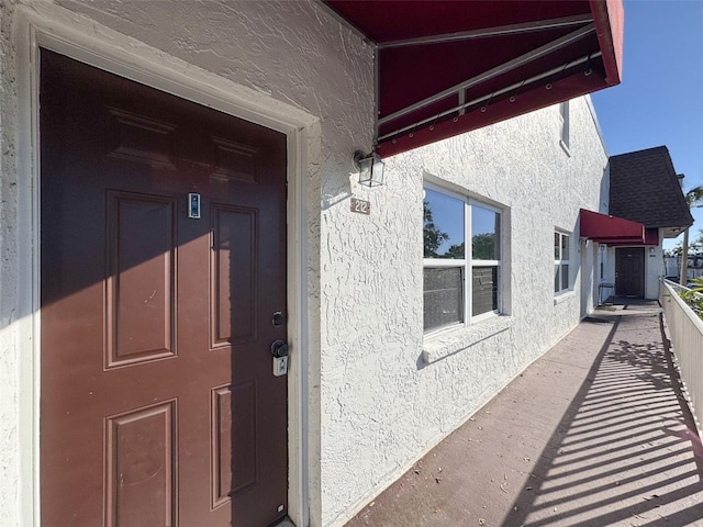 9201 Tudor Dr Unit C212, Tampa, FL 33615 - entrance to property with stucco siding
