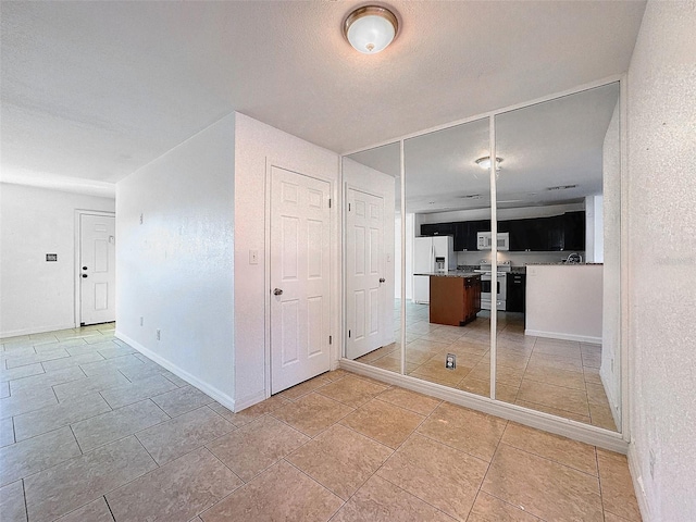 9201 Tudor Dr Unit C212, Tampa, FL 33615 - spare room with baseboards
