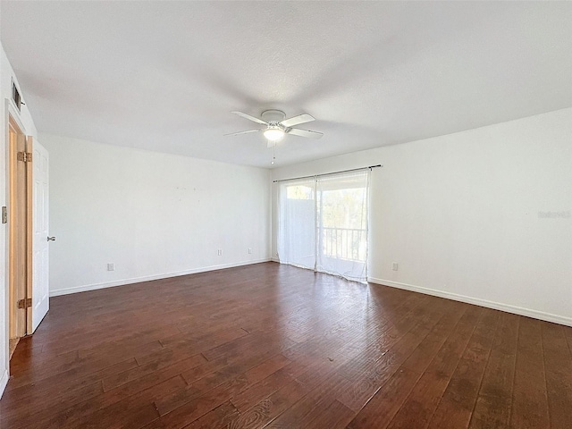 9201 Tudor Dr Unit C212, Tampa, FL 33615 - spare room with ceiling fan, dark wood finished floors, and baseboards
