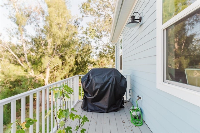 216 High St, Tarpon Springs, FL 34689 - wooden deck with a grill