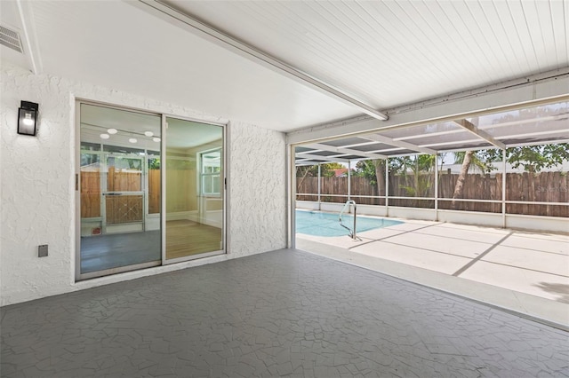 9241 Cochise Ln, Port Richey, FL 34668 - view of swimming pool featuring a fenced backyard, a patio, and a lanai