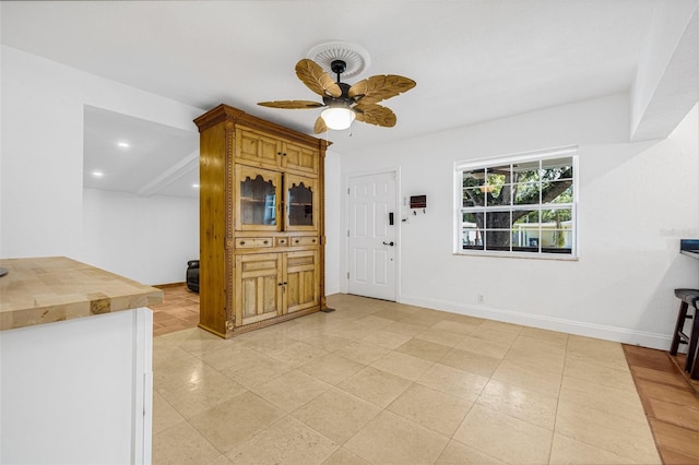 3310 W Ballast Point Blvd, Tampa, FL 33611 - foyer entrance featuring a ceiling fan, recessed lighting, baseboards, and light tile patterned flooring