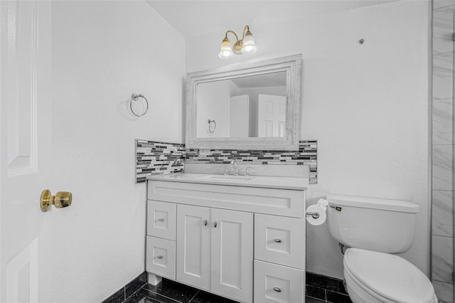 3310 W Ballast Point Blvd, Tampa, FL 33611 - bathroom with vanity, toilet, tasteful backsplash, and baseboards