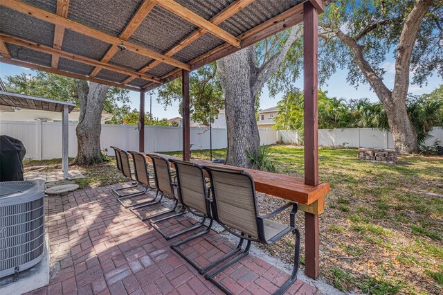 3310 W Ballast Point Blvd, Tampa, FL 33611 - view of patio / terrace with central AC and grilling area