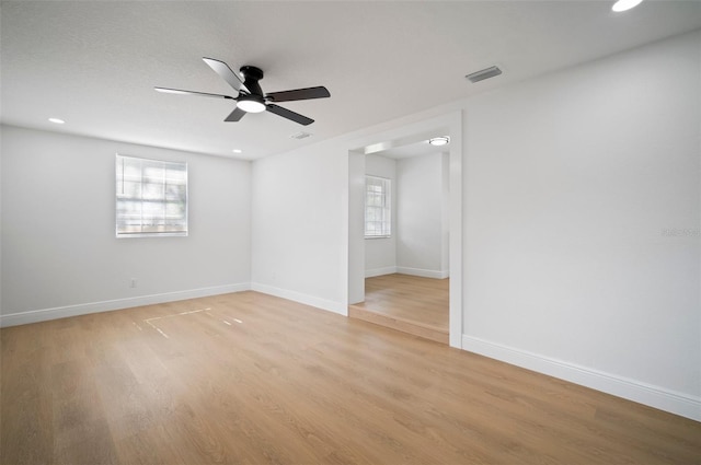 5405 S Sellas St, Tampa, FL 33611 - unfurnished room featuring a ceiling fan, light wood-type flooring, recessed lighting, and baseboards