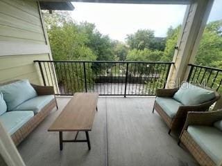 1235 SW 9th Rd Unit 317, Gainesville, FL 32601 - balcony featuring an outdoor living space