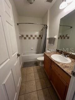 1235 SW 9th Rd Unit 317, Gainesville, FL 32601 - full bath featuring shower / bath combination with curtain, vanity, toilet, and tile patterned flooring