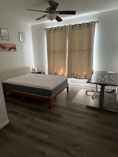 1235 SW 9th Rd Unit 317, Gainesville, FL 32601 - bedroom with wood finished floors and ceiling fan