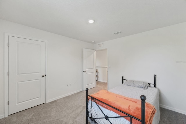 3739 Capri Coast Dr, Plant City, FL 33565 - bedroom with light colored carpet and baseboards
