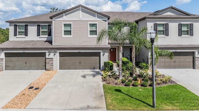 1396 White Fox Run, Lutz, FL 33549 - multi unit property featuring an attached garage, driveway, and a shingled roof