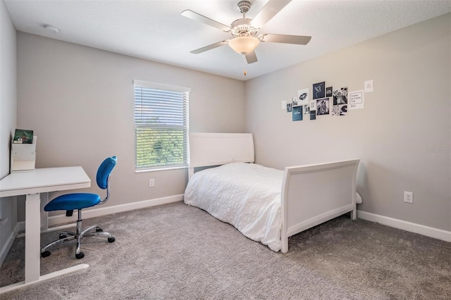 1396 White Fox Run, Lutz, FL 33549 - carpeted bedroom with baseboards, a desk, and a ceiling fan