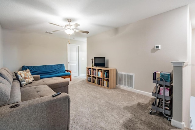 1396 White Fox Run, Lutz, FL 33549 - living area featuring a ceiling fan, carpet floors, and baseboards