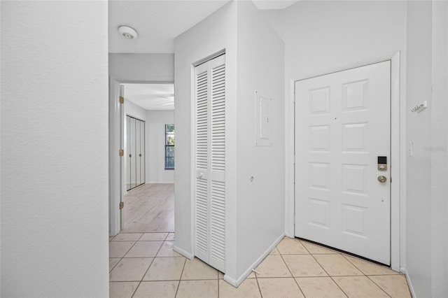3447 Killdeer Pl, Palm Harbor, FL 34685 - foyer with light tile patterned flooring