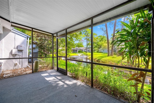 3447 Killdeer Pl, Palm Harbor, FL 34685 - unfurnished sunroom featuring a water view