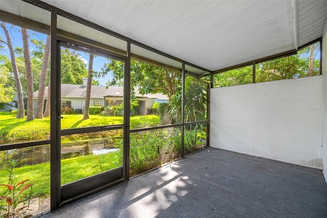 3447 Killdeer Pl, Palm Harbor, FL 34685 - unfurnished sunroom featuring a water view
