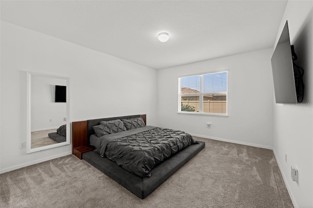 9271 Rally Spring Loop, Wesley Chapel, FL 33545 - bedroom featuring carpet floors and baseboards