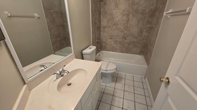 1416 Silverthorn Dr, Orlando, FL 32825 - full bath with tile patterned floors, vanity, toilet, and  shower combination