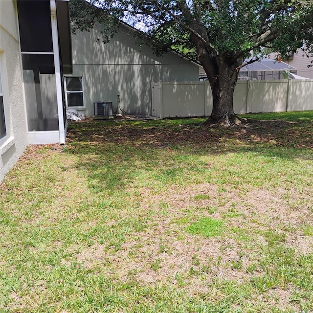 1416 Silverthorn Dr, Orlando, FL 32825 - view of yard featuring central AC unit