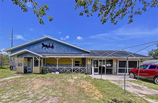 13341 Hexam Rd, Weeki Wachee, FL 34613 - view of front of home with covered porch