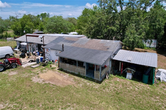 13341 Hexam Rd, Weeki Wachee, FL 34613 - view of front of home with a shingled roof and a front yard