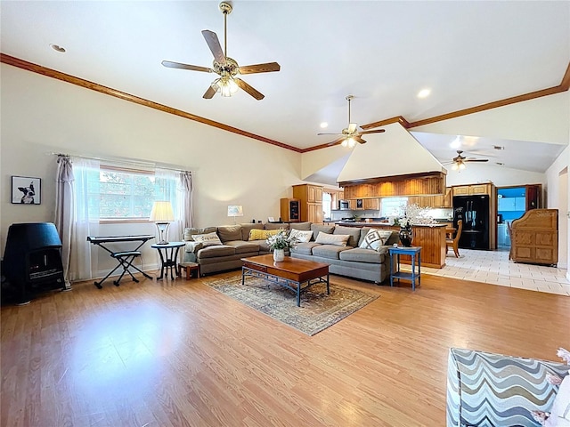 13341 Hexam Rd, Weeki Wachee, FL 34613 - living room featuring a ceiling fan, light wood-type flooring, vaulted ceiling, ornamental molding, and recessed lighting