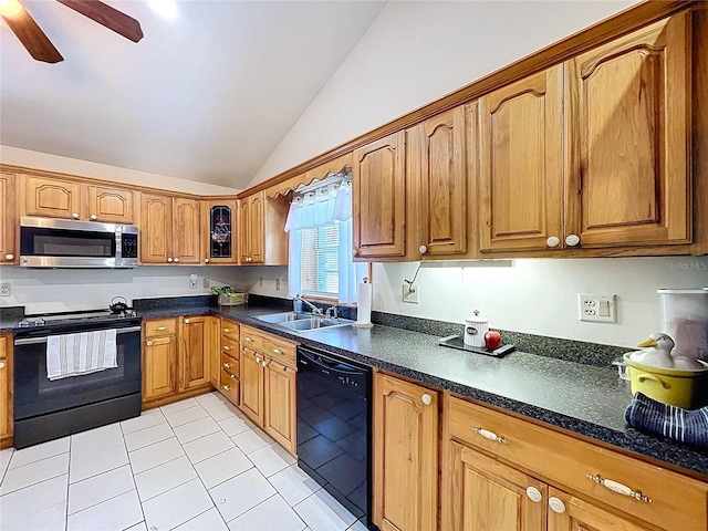 13341 Hexam Rd, Weeki Wachee, FL 34613 - kitchen with black appliances, vaulted ceiling, light tile patterned floors, ceiling fan, and dark countertops