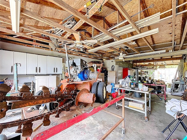 13341 Hexam Rd, Weeki Wachee, FL 34613 - garage featuring a workshop area