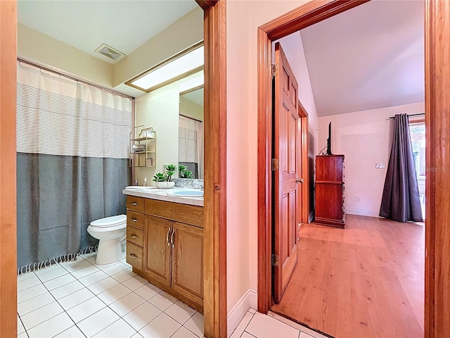 13341 Hexam Rd, Weeki Wachee, FL 34613 - full bath with vanity, tile patterned floors, and a shower with curtain