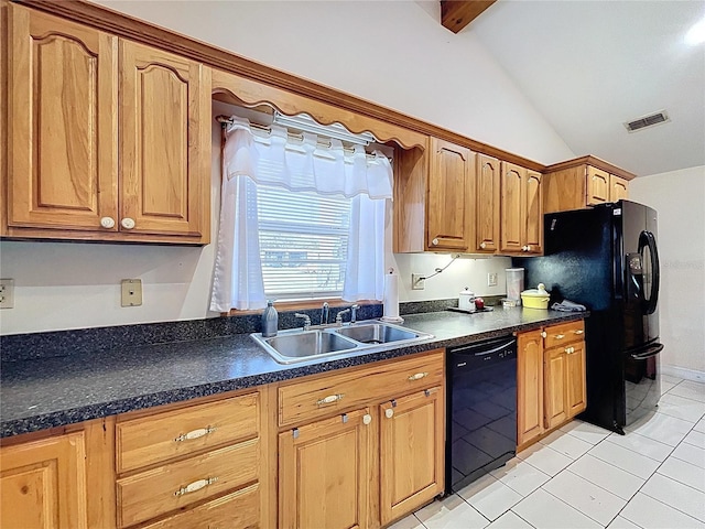 13341 Hexam Rd, Weeki Wachee, FL 34613 - kitchen featuring black appliances, vaulted ceiling, dark countertops, light tile patterned floors, and brown cabinetry