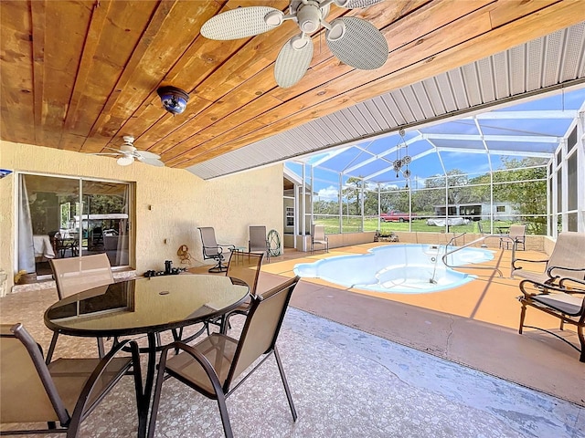 13341 Hexam Rd, Weeki Wachee, FL 34613 - view of patio / terrace featuring a ceiling fan, an empty pool, and a lanai