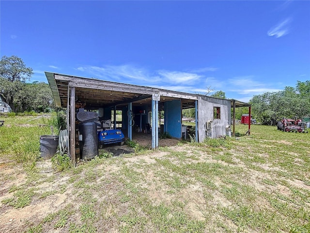 13341 Hexam Rd, Weeki Wachee, FL 34613 - view of pole building with a carport