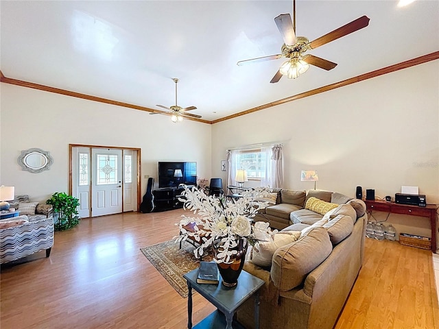 13341 Hexam Rd, Weeki Wachee, FL 34613 - living room with a ceiling fan, light wood-style flooring, ornamental molding, and a towering ceiling