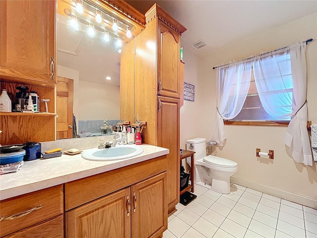 13341 Hexam Rd, Weeki Wachee, FL 34613 - bathroom with tile patterned flooring and vanity