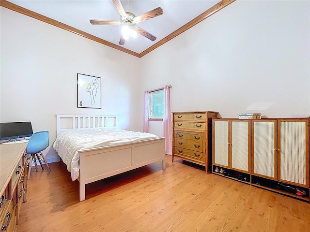 13341 Hexam Rd, Weeki Wachee, FL 34613 - bedroom with crown molding, light wood finished floors, lofted ceiling, and a ceiling fan