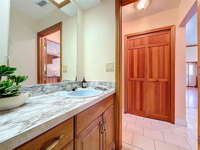13341 Hexam Rd, Weeki Wachee, FL 34613 - bathroom featuring tile patterned flooring and vanity