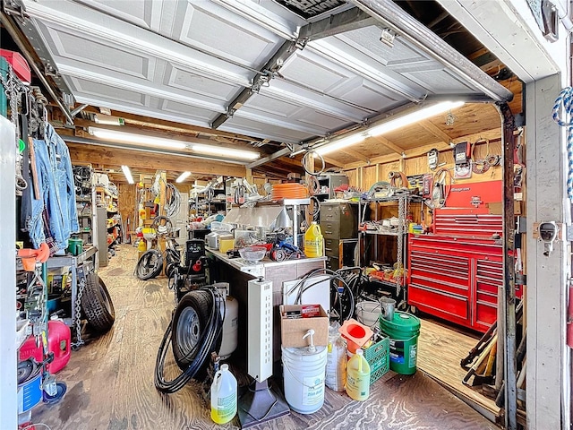 13341 Hexam Rd, Weeki Wachee, FL 34613 - garage with a workshop area
