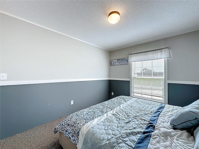 8851 C 469, Center Hill, FL 33514 - carpeted bedroom with a textured ceiling