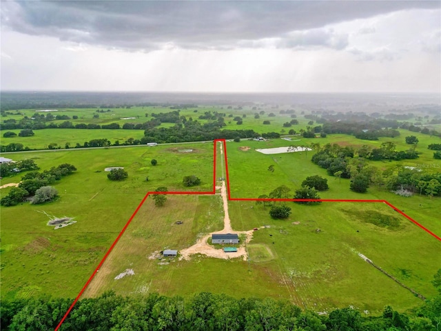 8851 C 469, Center Hill, FL 33514 - aerial view of sparsely populated area featuring property parcel outlined and agricultural land