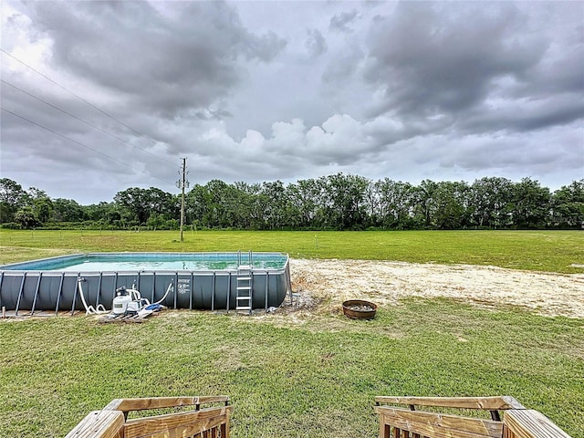 8851 C 469, Center Hill, FL 33514 - view of grassy yard with an outdoor pool